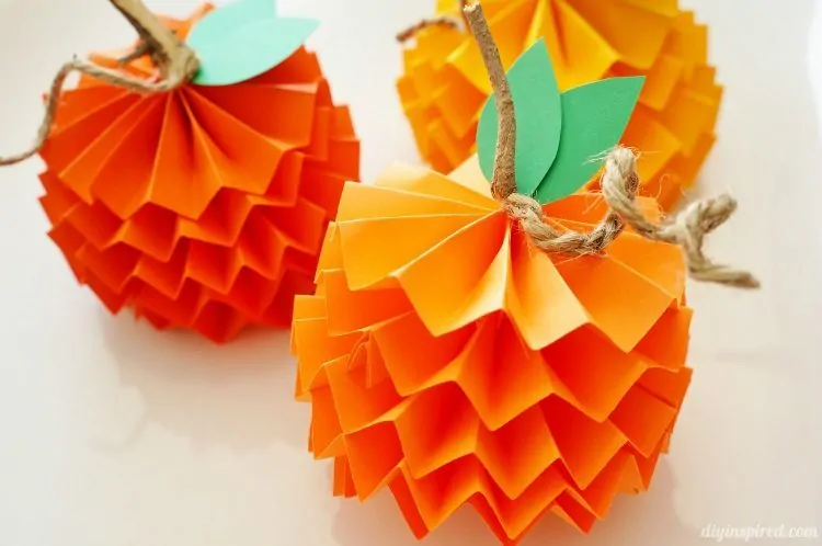 paper-pumpkins Colorful pumpkins made from folded construction paper