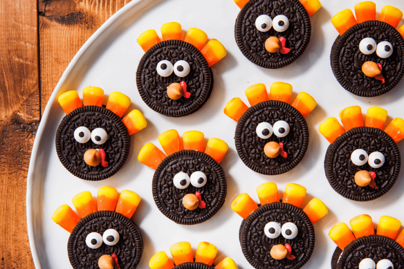 oreo-turkeys A platter holds Oreo cookies with candy corn feathers and edible candy eyes and beaks