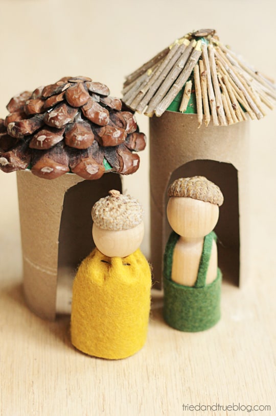 woodland-folks Sweet figurines made from wooden pegs standing in front of little cottages made from paper rolls