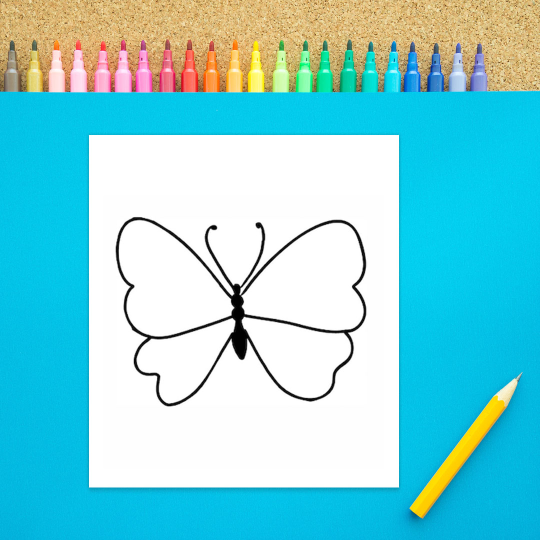 A black body with an oval and three black circles is shown with two long antennae coming off of it. Two wings each consisting of a larger heart shape and  smaller heart shape are shown coming off of the body in this second step of how to draw a butterfly. It is black marker on a white background.