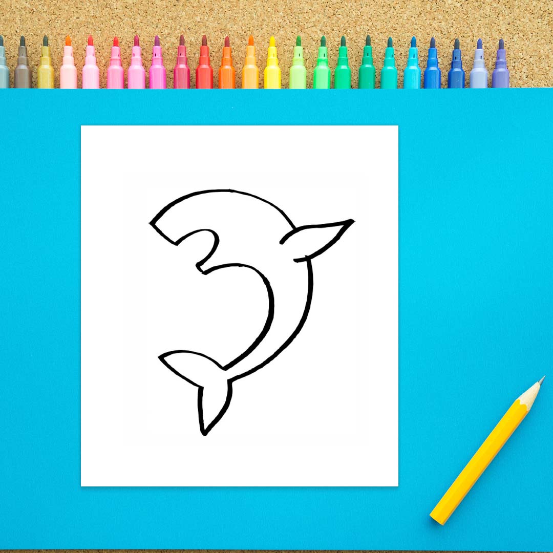 A rough outline of a shark shape is shown drawn in black marker on a white background.