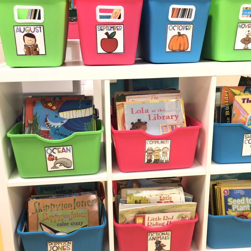 Colorful Classroom Library Bins Colorful classroom library bins filled with books.