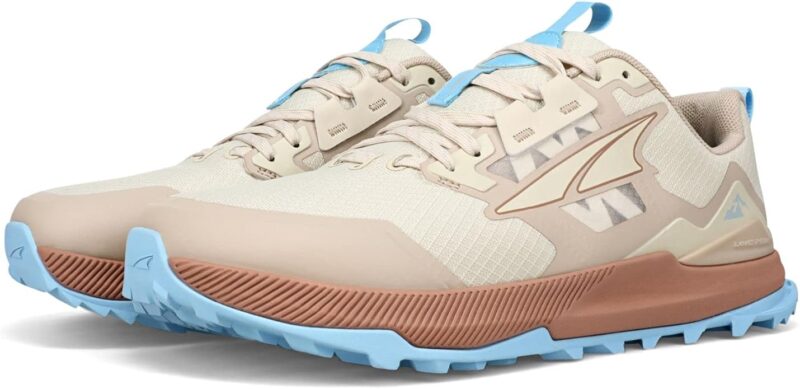 Altra Lone Peak athletic shoes in tan with blue soles