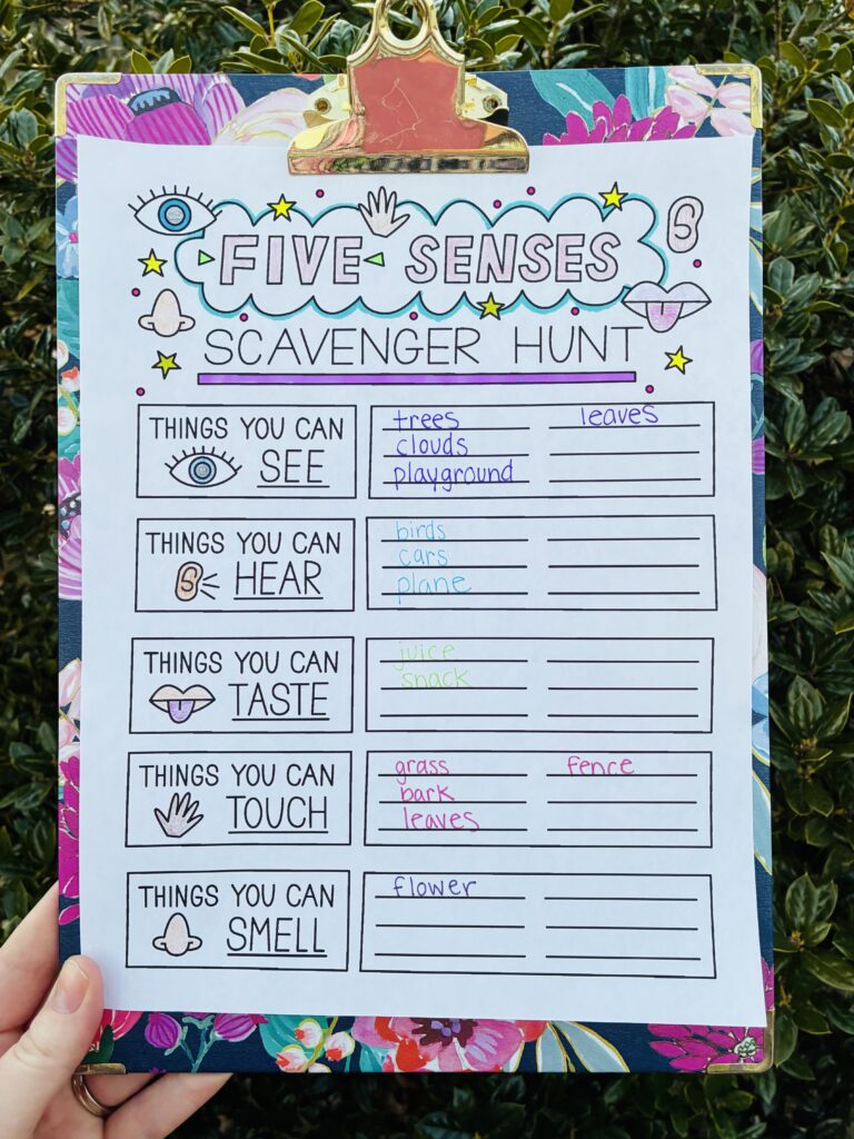 a photo of a clipboard and a five senses scavenger hunt outsides
