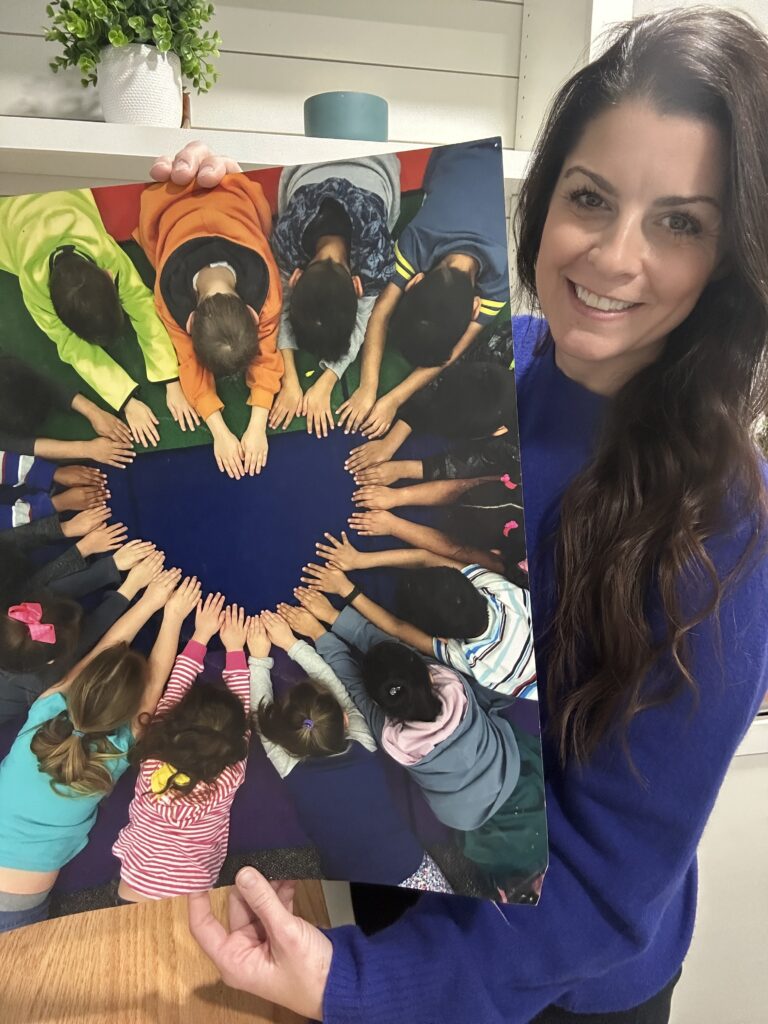 Hilary holding heart