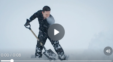 An AI video of Erik Ofgang shoveling snow.