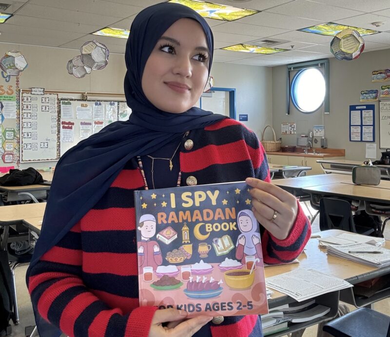 zebo-with-book Zebo holding book