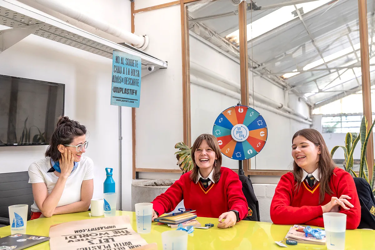 Buenos Aires, Argentina - 2024/04/24: Agustina “Tati” Besada and the Unplastify Team are seen in their coworking space in Buenos Aires, Argentina, alongside the school winners of the 'Unplastify Challenge,' an international educational program designed to empower 15 and 16-year-olds to actively engage with the global issue of plastic.